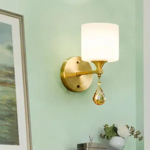 Modern Milk Glass Wall Sconce with Brass Finish and Amber Crystal Draping